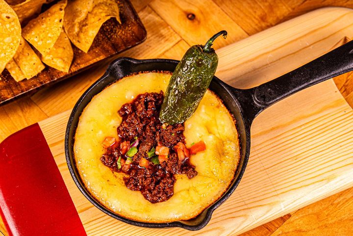 Estrella Taqueria Lounge signature dishes Queso FundidoAguachilesPulpo Adobo